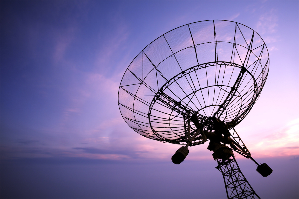 Purple Sky with Satellite Dish Point Up to the Heavens